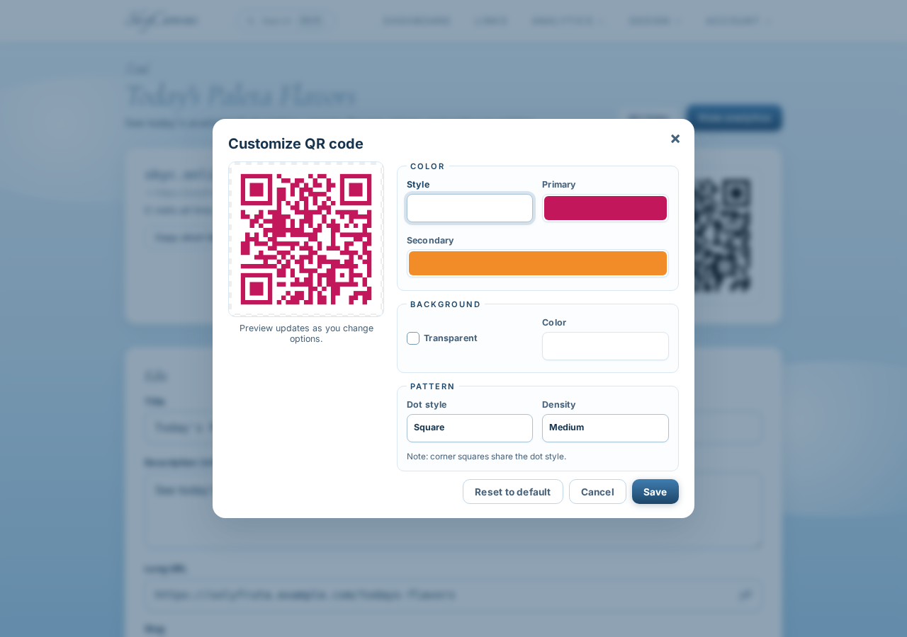 QR customization controls with berry pink and orange brand colors applied to the modules and shown in the live preview